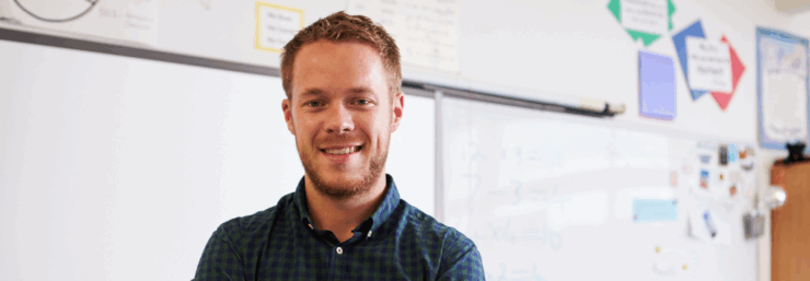 male cover supervisor in uk classroom